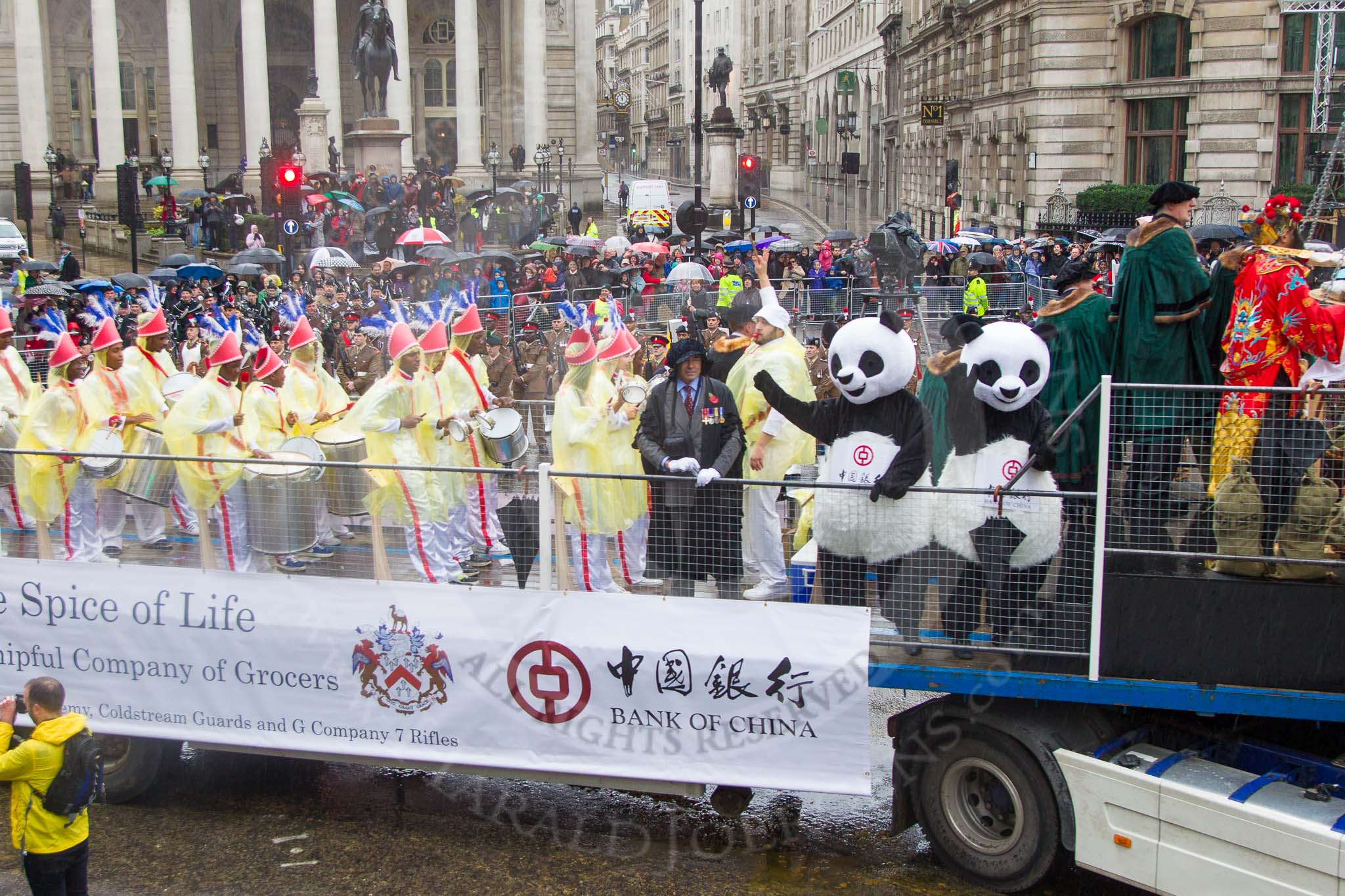 Lord Mayor's Show 2013: 6-Worshipful Company of Grocers- The Spice of Life, represented by the Coldstream Guards, G Company 7th Rifles and participants from Oundle School and Mossbourne Academy..
Press stand opposite Mansion House, City of London,
London,
Greater London,
United Kingdom,
on 09 November 2013 at 11:02, image #174