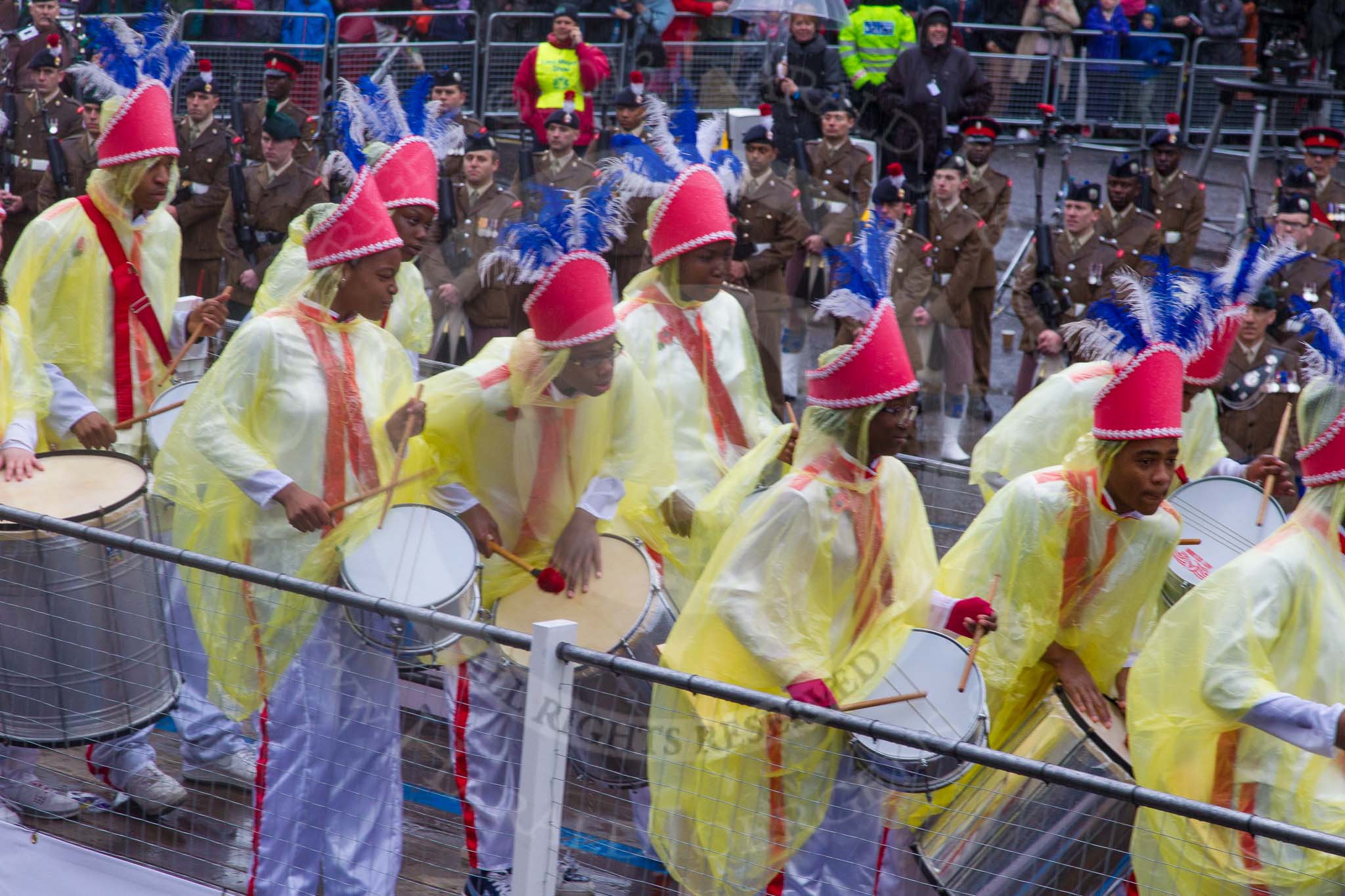 Lord Mayor's Show 2013: 6-Worshipful Company of Grocers- The Spice of Life, represented by the Coldstream Guards, G Company 7th Rifles and participants from Oundle School and Mossbourne Academy..
Press stand opposite Mansion House, City of London,
London,
Greater London,
United Kingdom,
on 09 November 2013 at 11:02, image #177