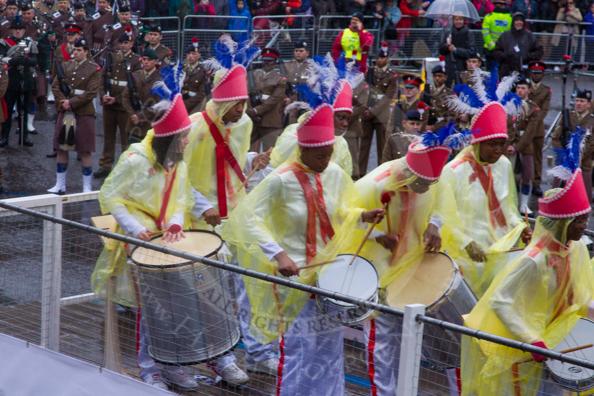 Lord Mayor's Show 2013: 6-Worshipful Company of Grocers- The Spice of Life, represented by the Coldstream Guards, G Company 7th Rifles and participants from Oundle School and Mossbourne Academy..
Press stand opposite Mansion House, City of London,
London,
Greater London,
United Kingdom,
on 09 November 2013 at 11:02, image #178