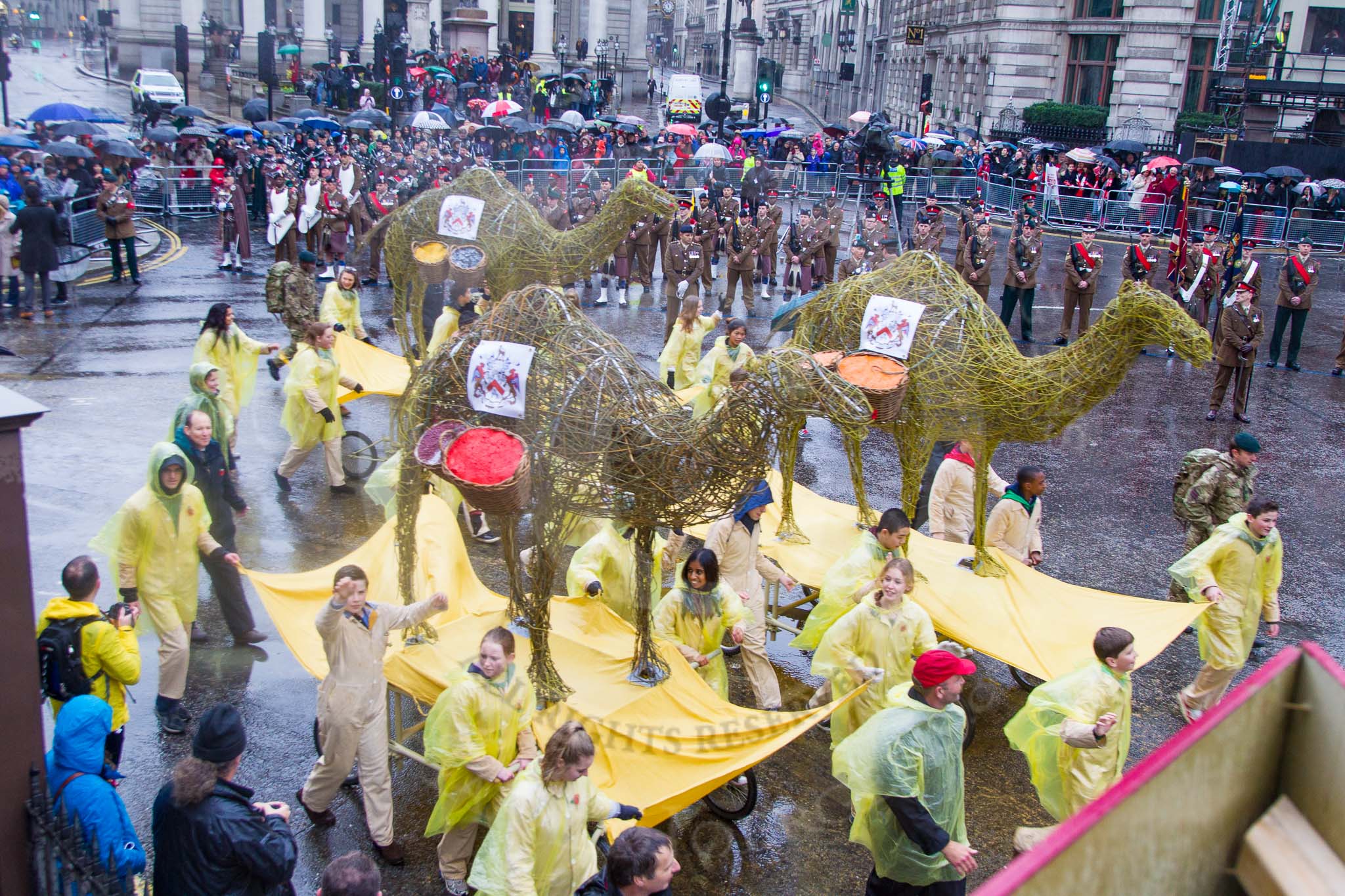 Lord Mayor's Show 2013: 6-Worshipful Company of Grocers- The Spice of Life, represented by the Coldstream Guards, G Company 7th Rifles and participants from Oundle School and Mossbourne Academy..
Press stand opposite Mansion House, City of London,
London,
Greater London,
United Kingdom,
on 09 November 2013 at 11:02, image #183