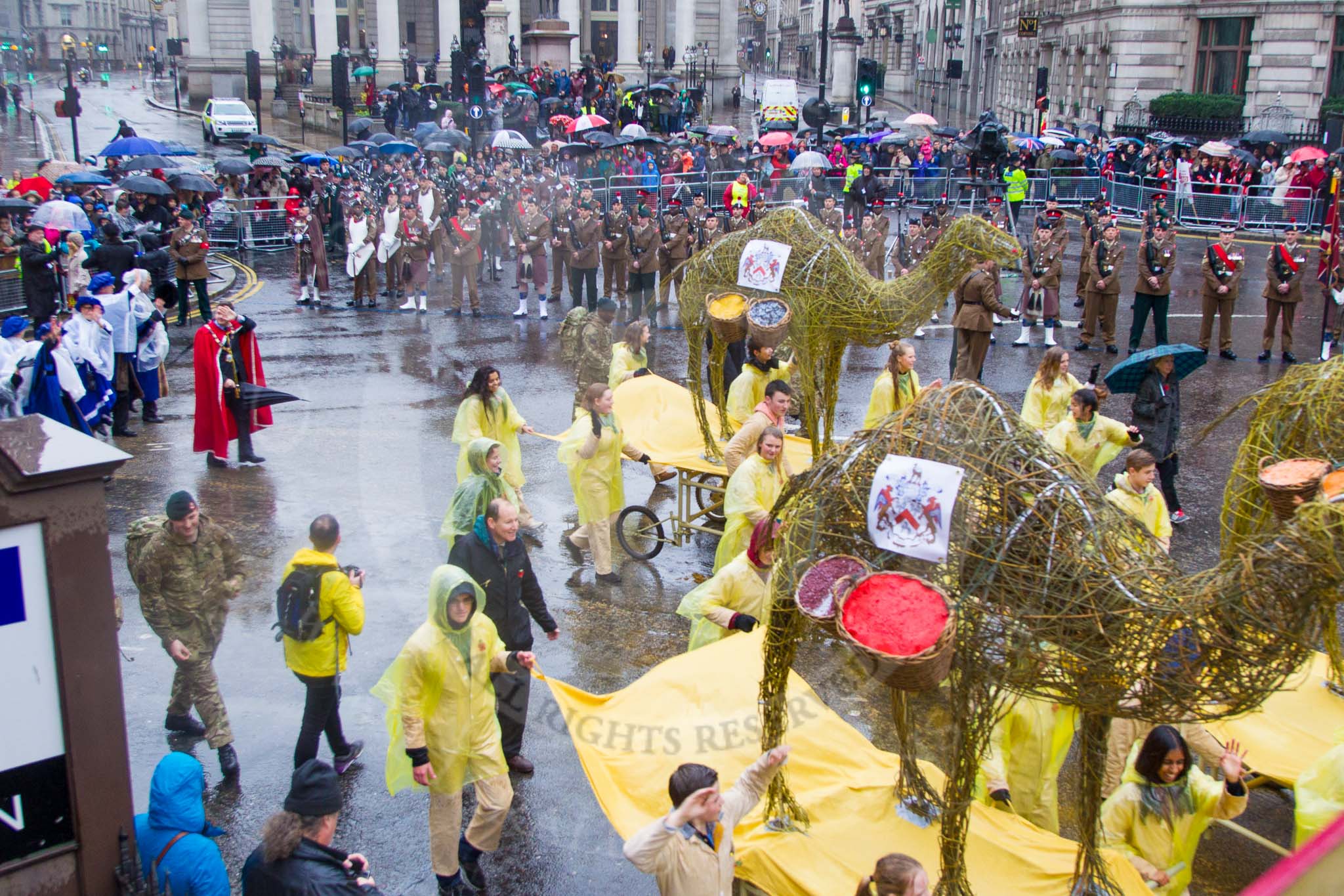 Lord Mayor's Show 2013: 6-Worshipful Company of Grocers- The Spice of Life, represented by the Coldstream Guards, G Company 7th Rifles and participants from Oundle School and Mossbourne Academy..
Press stand opposite Mansion House, City of London,
London,
Greater London,
United Kingdom,
on 09 November 2013 at 11:02, image #184