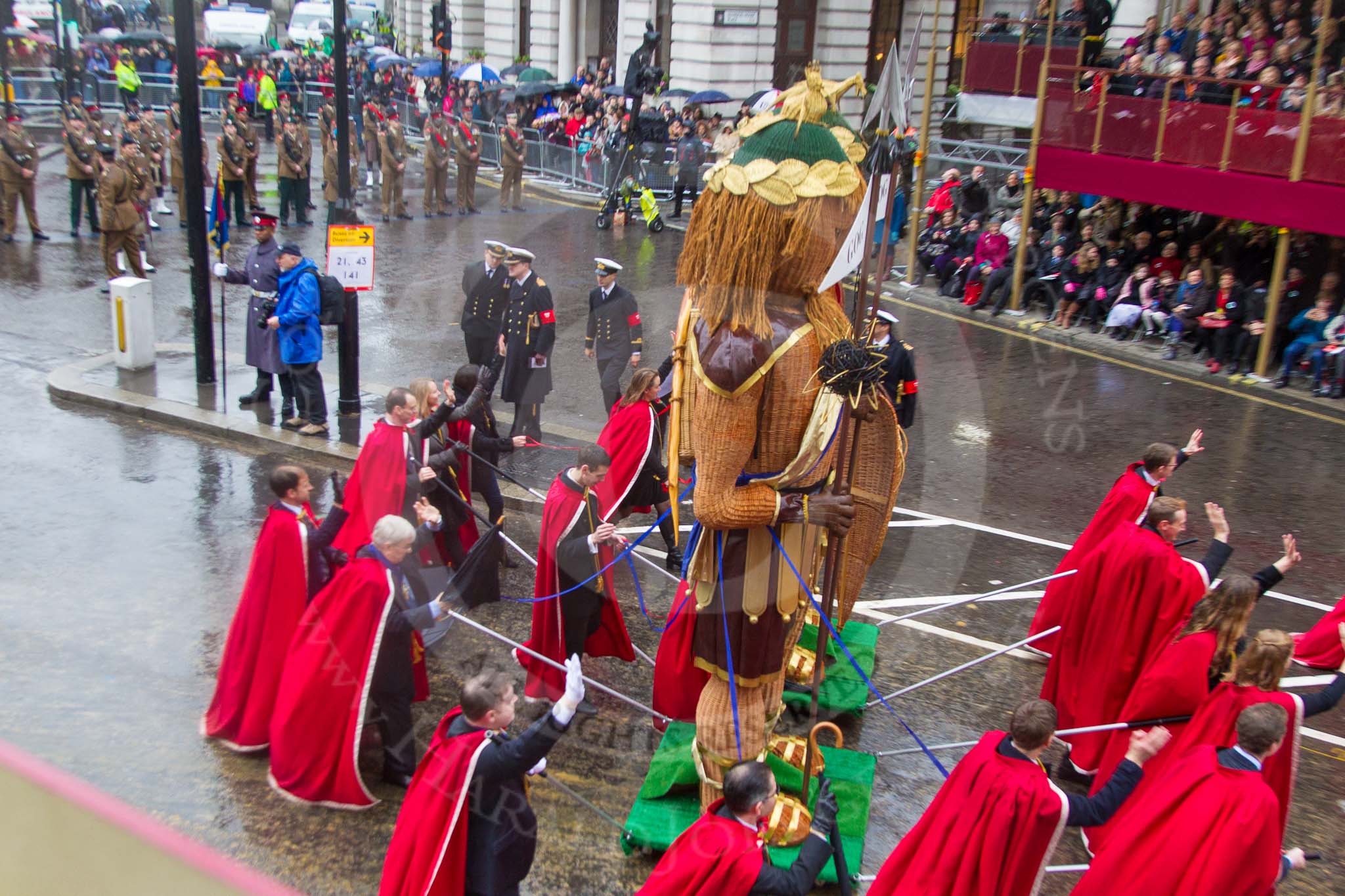 Lord Mayor's Show 2013: 7-Society of Young Freemen, escorts the figures of God and Magog, traditional guardians of London made by Worshipful Company of Basketmakers..
Press stand opposite Mansion House, City of London,
London,
Greater London,
United Kingdom,
on 09 November 2013 at 11:03, image #194