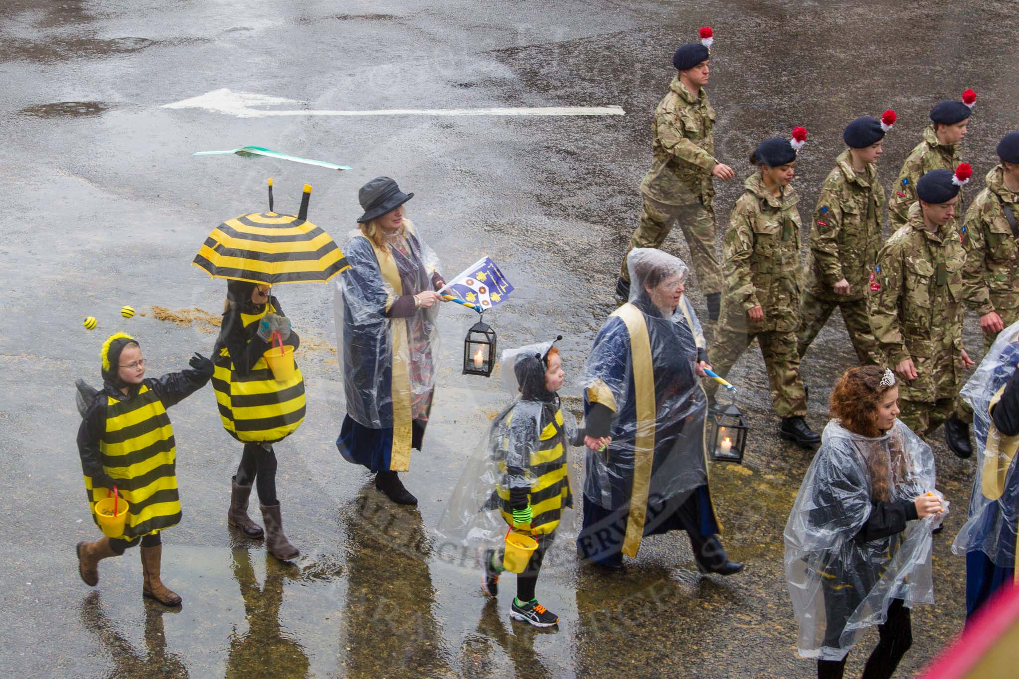 Lord Mayor's Show 2013: 11-Worshipful Company of Wax Chandlers- orginally based on the beeswax trade with representatives from 5 Rifles and British wax industry..
Press stand opposite Mansion House, City of London,
London,
Greater London,
United Kingdom,
on 09 November 2013 at 11:05, image #247