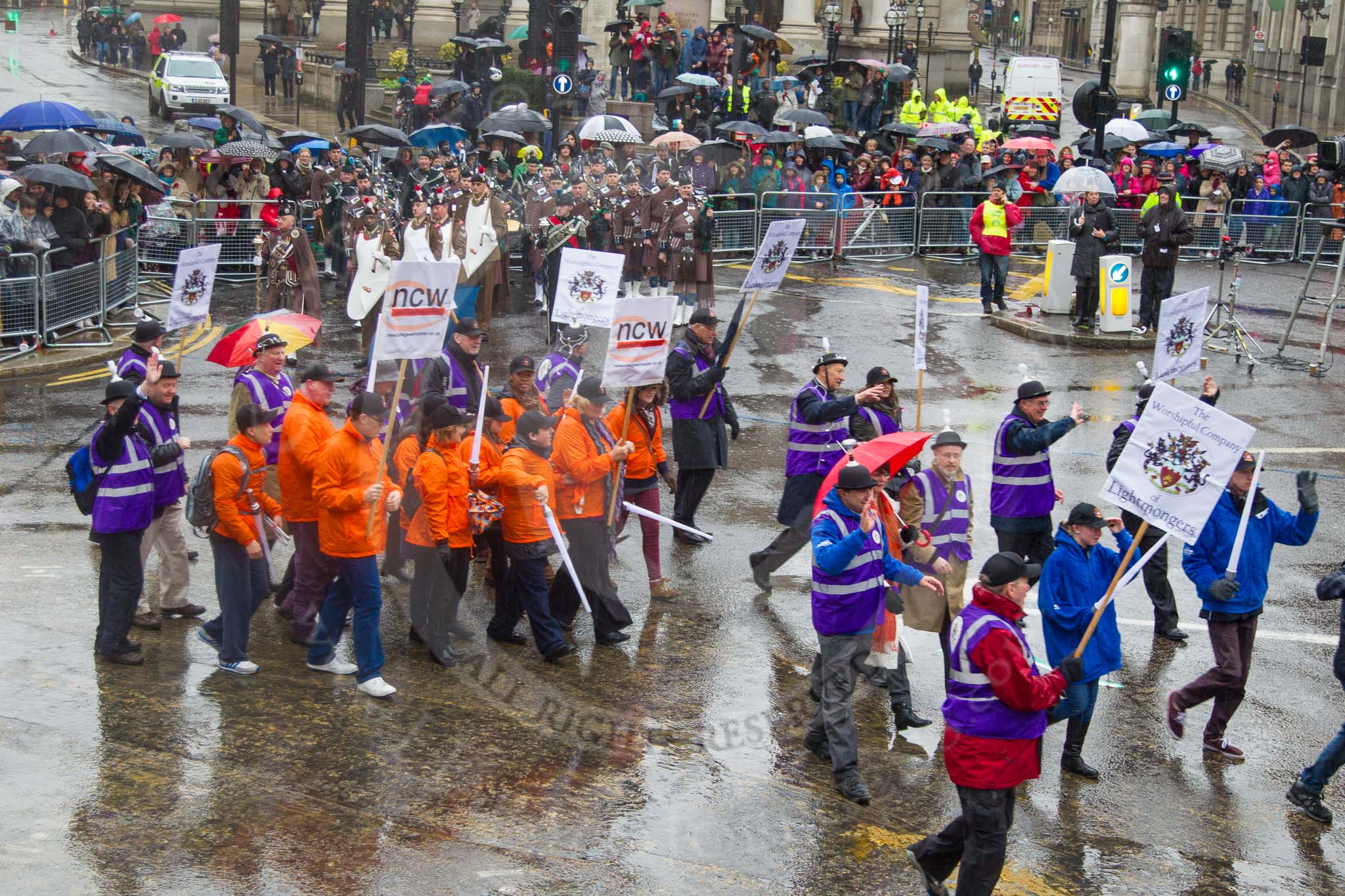 Lord Mayor's Show 2013: 12-Worshipful Company of Lightmongers-Modern Livery Companies. with members from all section of the lighting and electrical industry..
Press stand opposite Mansion House, City of London,
London,
Greater London,
United Kingdom,
on 09 November 2013 at 11:05, image #253