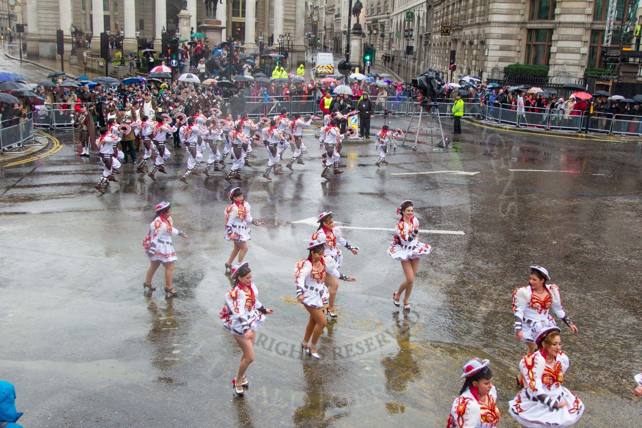 Lord Mayor's Show 2013: 20-Coporales San Simon Londres-community group that promotes Bolivian culture and folklore through performing traditional 'Caporales' dance..
Press stand opposite Mansion House, City of London,
London,
Greater London,
United Kingdom,
on 09 November 2013 at 11:10, image #321