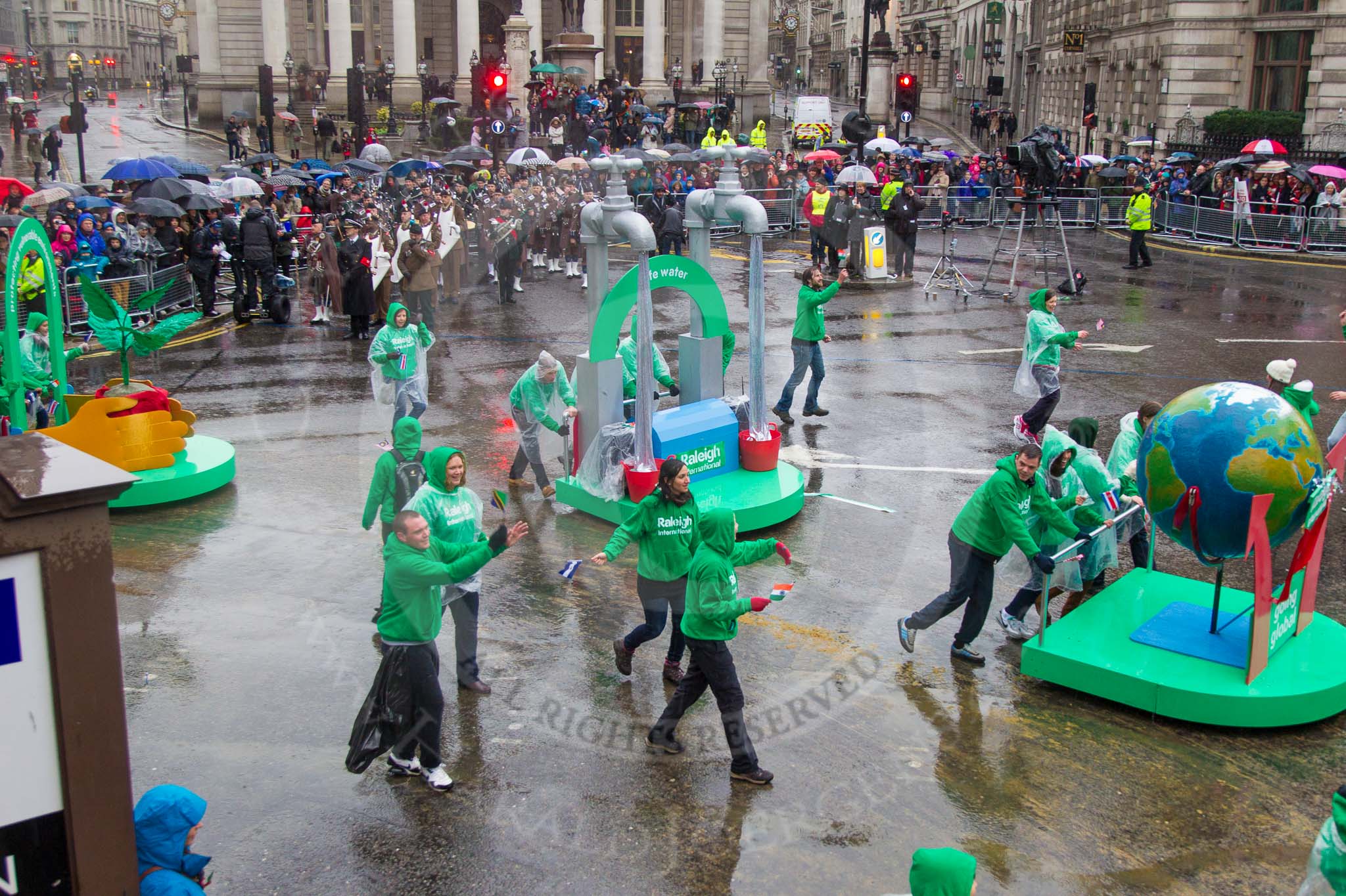 Lord Mayor's Show 2013: 21-Raleigh International-is a charity that challenges and empowers young people to deliver grassroots sustainable development. Its programmes focus on provading access to safe water and sanitation..
Press stand opposite Mansion House, City of London,
London,
Greater London,
United Kingdom,
on 09 November 2013 at 11:10, image #329