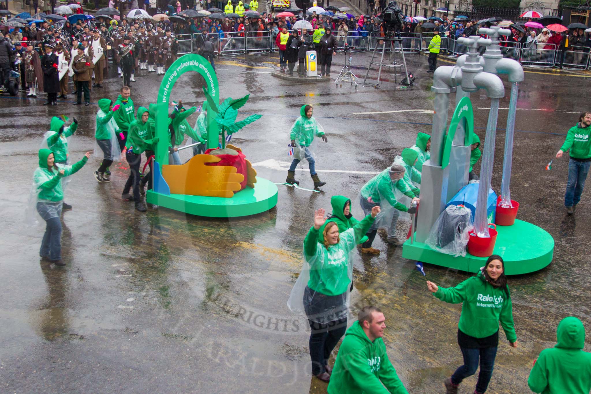 Lord Mayor's Show 2013: 21-Raleigh International-is a charity that challenges and empowers young people to deliver grassroots sustainable development. Its programmes focus on provading access to safe water and sanitation..
Press stand opposite Mansion House, City of London,
London,
Greater London,
United Kingdom,
on 09 November 2013 at 11:11, image #331