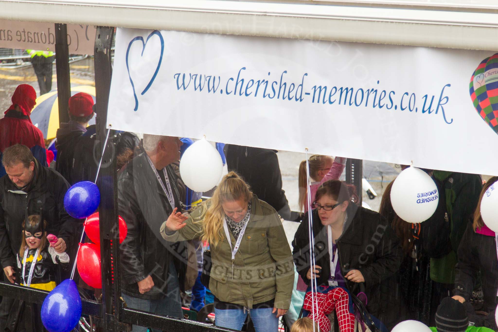 Lord Mayor's Show 2013: 34-Cherished Memories-organises high-profile days of family bonding for life-limited and disabled children from hospices in South-East England..
Press stand opposite Mansion House, City of London,
London,
Greater London,
United Kingdom,
on 09 November 2013 at 11:18, image #447