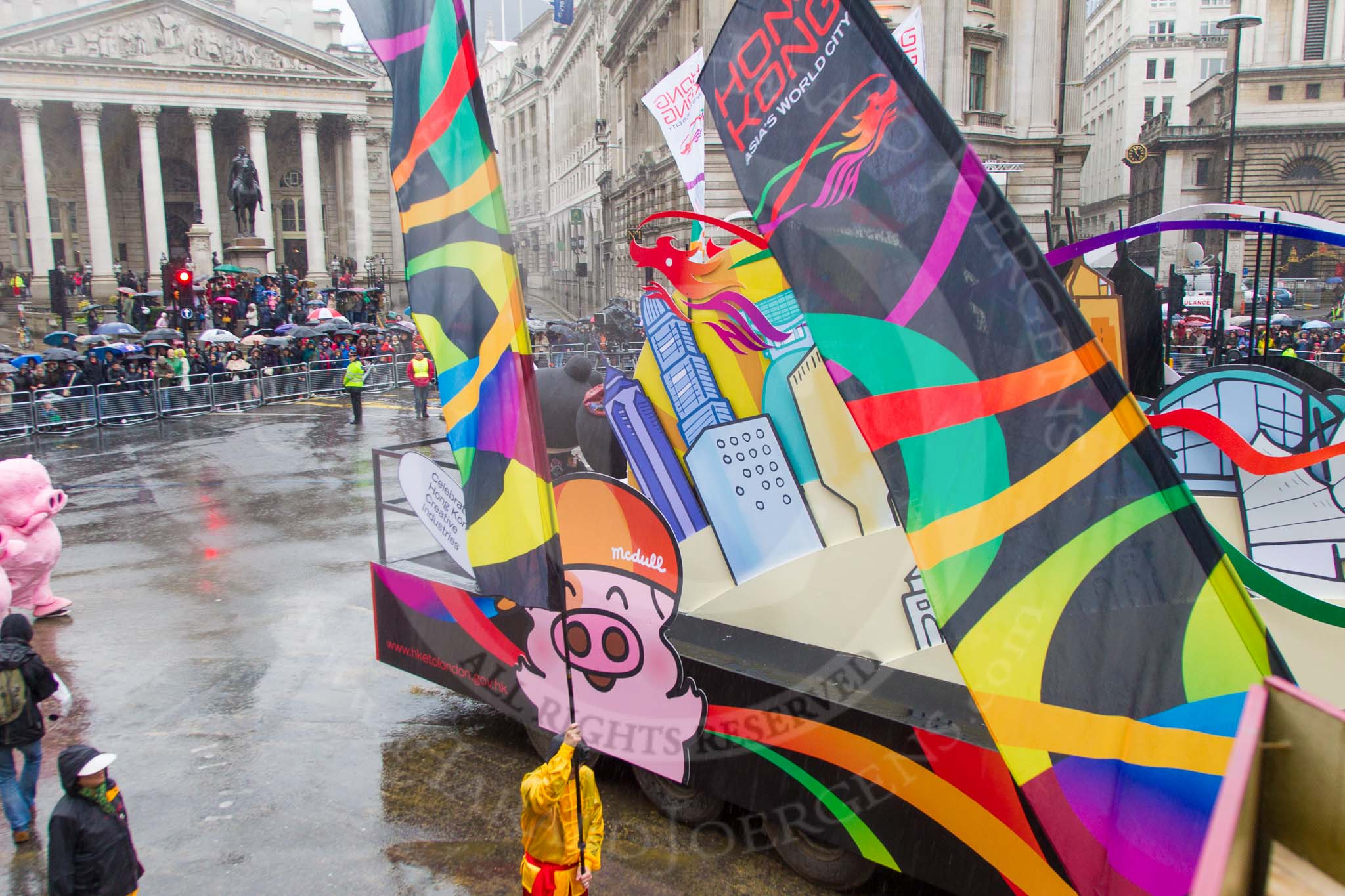 Lord Mayor's Show 2013: 38- Hong-Kong Economic and Trade Office, London-official representation of the Hong-Kong Government in the UK..
Press stand opposite Mansion House, City of London,
London,
Greater London,
United Kingdom,
on 09 November 2013 at 11:20, image #481