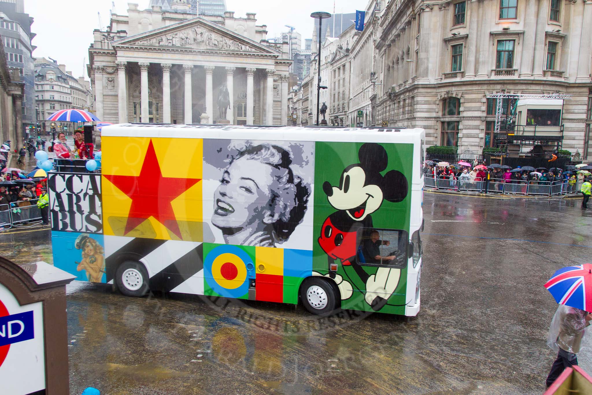 Lord Mayor's Show 2013: 58-CCA ART BUS-is mobile work of art and art gallery designed by Sir Peter Blake..
Press stand opposite Mansion House, City of London,
London,
Greater London,
United Kingdom,
on 09 November 2013 at 11:31, image #730