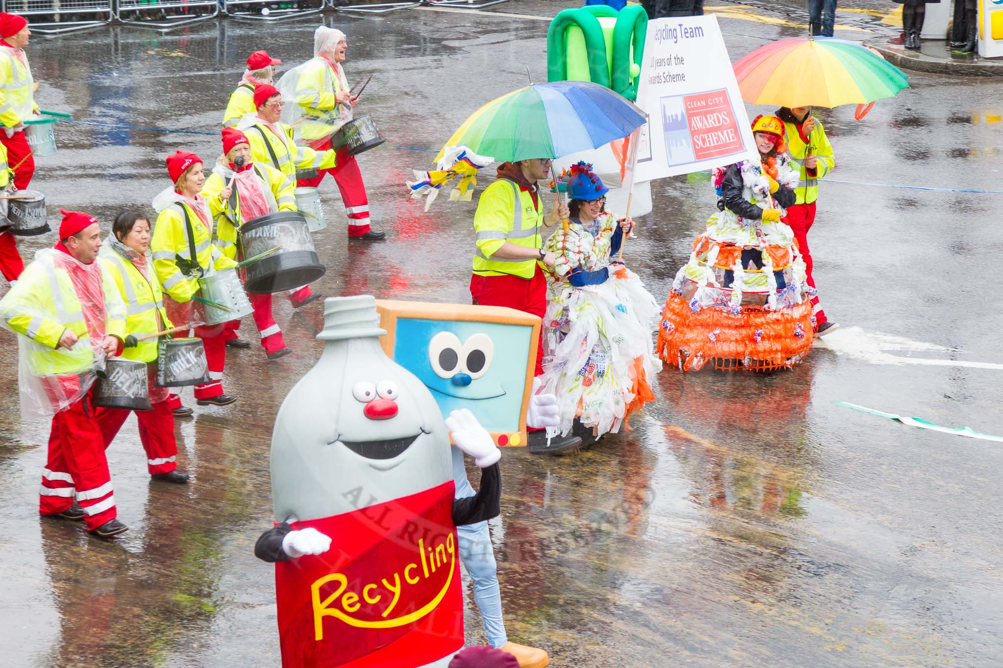 Lord Mayor's Show 2013: 59-Recycling in the City- The Binbot is joined again by his drumming street sweepers to celebrate 20th anniversary of the City's unique Clean City Awards scheme..
Press stand opposite Mansion House, City of London,
London,
Greater London,
United Kingdom,
on 09 November 2013 at 11:31, image #734