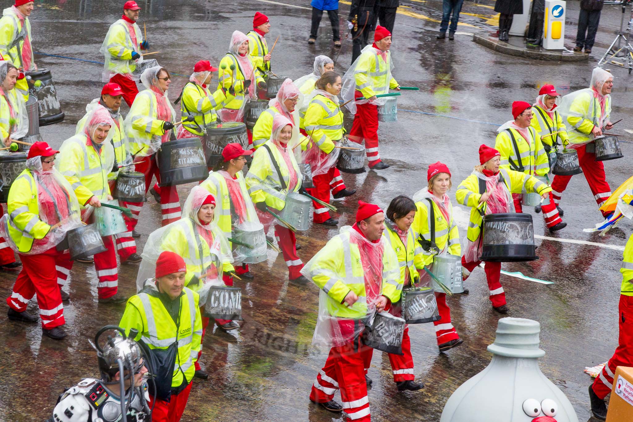 Lord Mayor's Show 2013: 59-Recycling in the City- The Binbot is joined again by his drumming street sweepers to celebrate 20th anniversary of the City's unique Clean City Awards scheme..
Press stand opposite Mansion House, City of London,
London,
Greater London,
United Kingdom,
on 09 November 2013 at 11:31, image #736