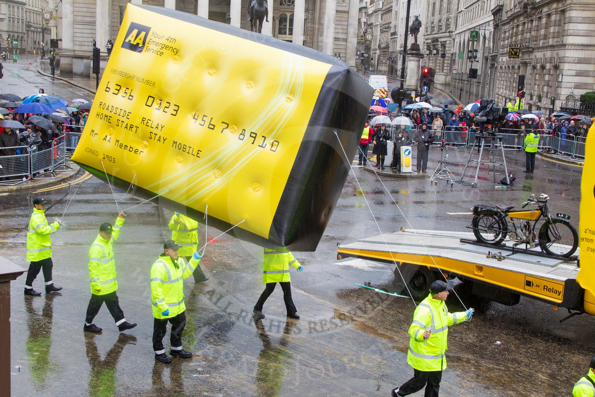 Lord Mayor's Show 2013: 60- The Automobile Association-AA1, the AA's 1904 Renault, and AA2 , a 1918 Chater-Lea motorcycle lead the AAs procession of historical amd modern patrol vehicles..
Press stand opposite Mansion House, City of London,
London,
Greater London,
United Kingdom,
on 09 November 2013 at 11:33, image #766