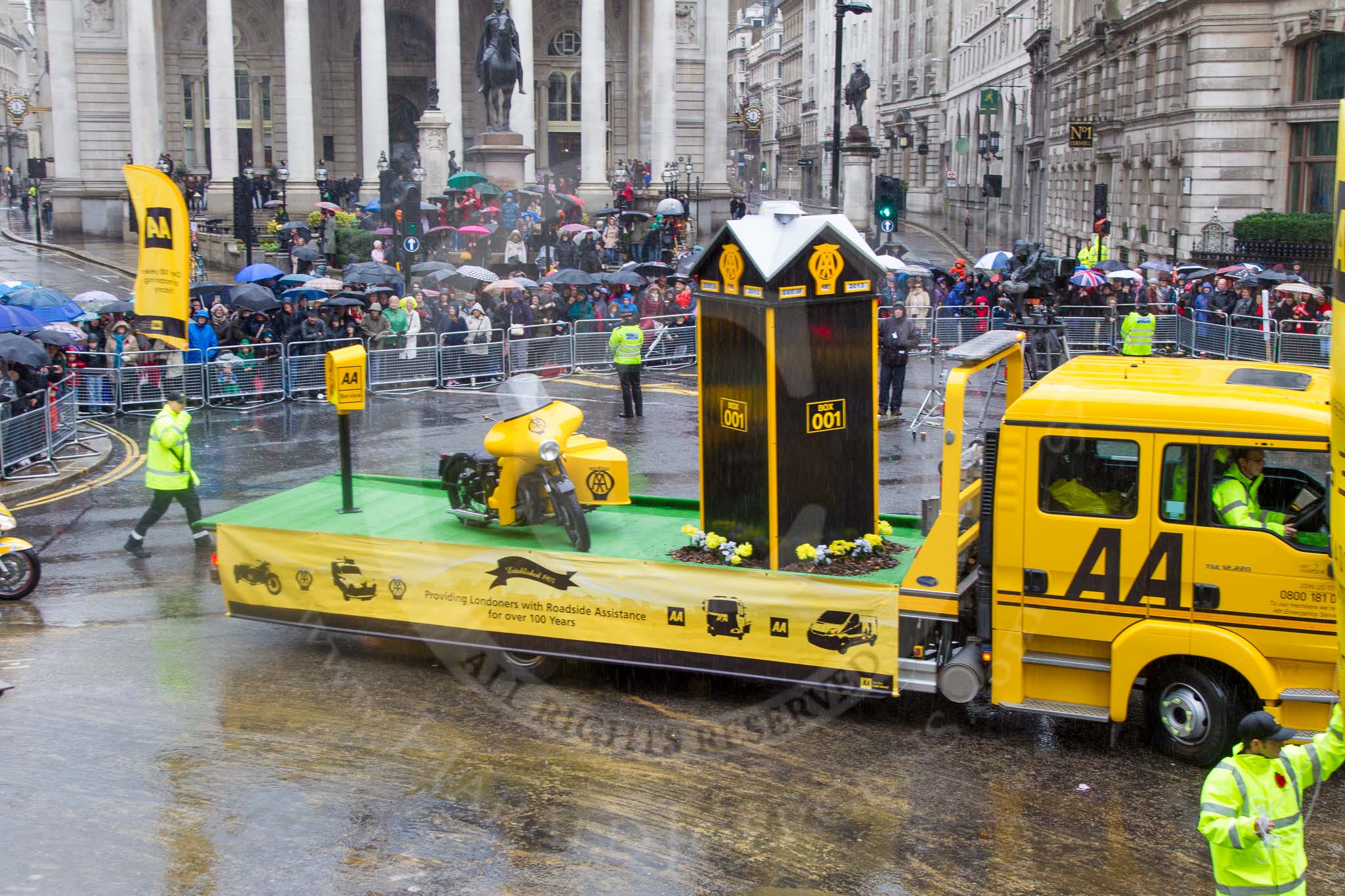 Lord Mayor's Show 2013: 60- The Automobile Association-AA1, the AA's 1904 Renault, and AA2 , a 1918 Chater-Lea motorcycle lead the AAs procession of historical amd modern patrol vehicles..
Press stand opposite Mansion House, City of London,
London,
Greater London,
United Kingdom,
on 09 November 2013 at 11:33, image #770