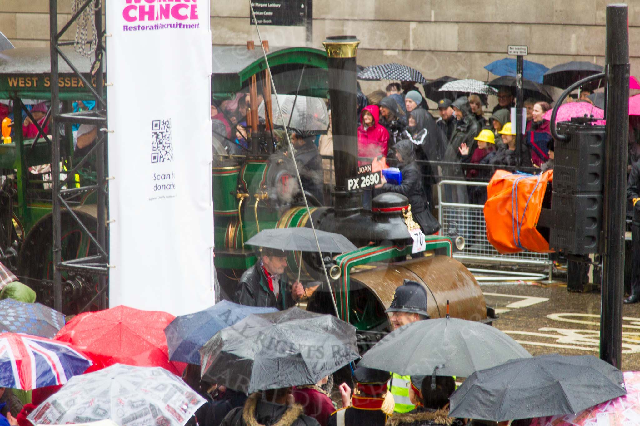 Lord Mayor's Show 2013: 70-Worshipful Company of Paviors-which brings together construction-industry professionals involved with roads and pavements.This year's float features the 'pig' that mediaeval paviors would have cleared from city streets and it towed by a steamroller from Amberley museum..
Press stand opposite Mansion House, City of London,
London,
Greater London,
United Kingdom,
on 09 November 2013 at 11:38, image #843