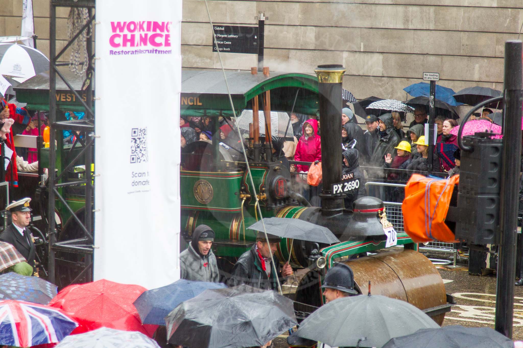 Lord Mayor's Show 2013: 70-Worshipful Company of Paviors-which brings together construction-industry professionals involved with roads and pavements.This year's float features the 'pig' that mediaeval paviors would have cleared from city streets and it towed by a steamroller from Amberley museum..
Press stand opposite Mansion House, City of London,
London,
Greater London,
United Kingdom,
on 09 November 2013 at 11:38, image #844