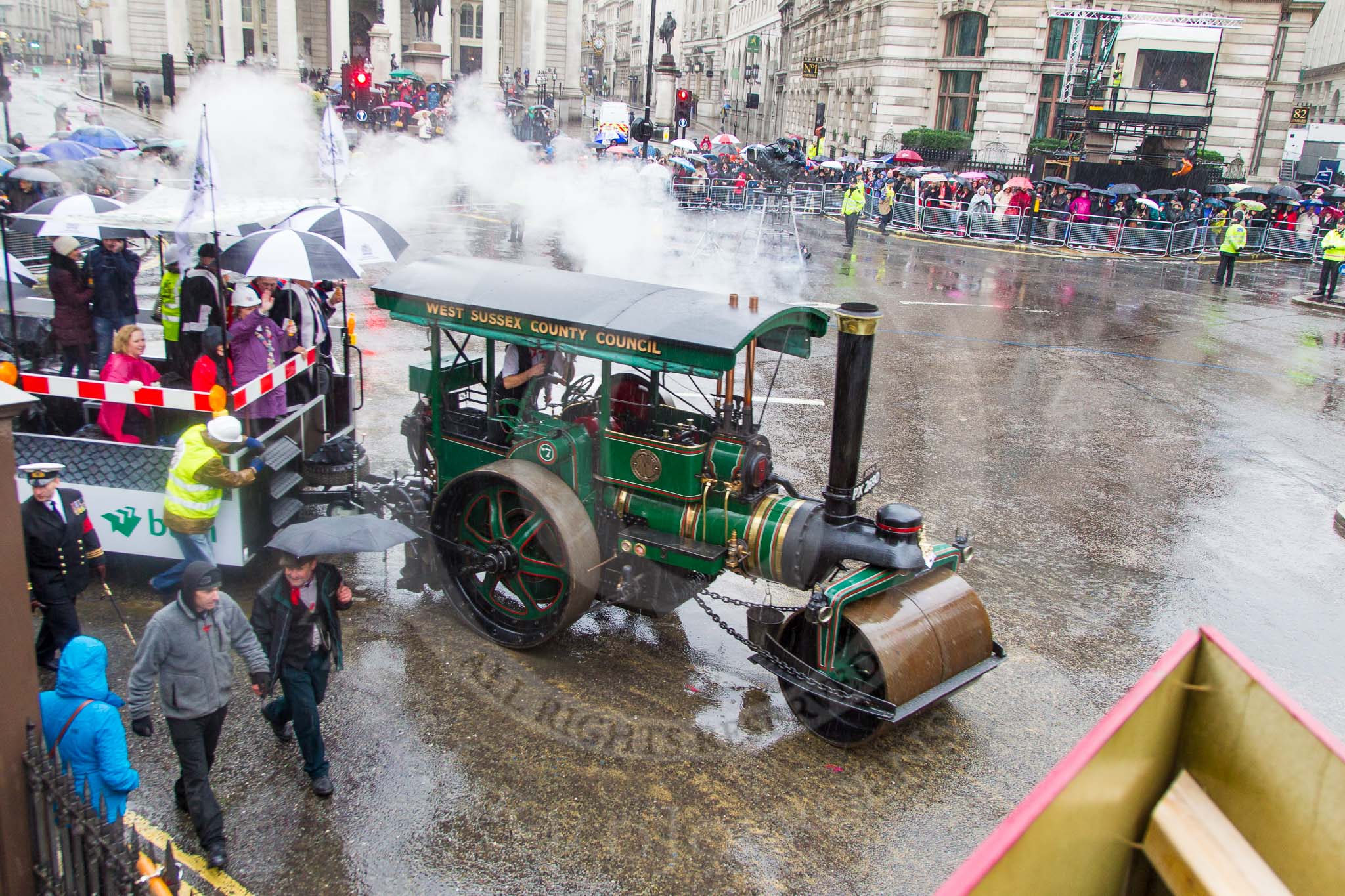 Lord Mayor's Show 2013: 70-Worshipful Company of Paviors-which brings together construction-industry professionals involved with roads and pavements.This year's float features the 'pig' that mediaeval paviors would have cleared from city streets and it towed by a steamroller from Amberley museum..
Press stand opposite Mansion House, City of London,
London,
Greater London,
United Kingdom,
on 09 November 2013 at 11:39, image #848