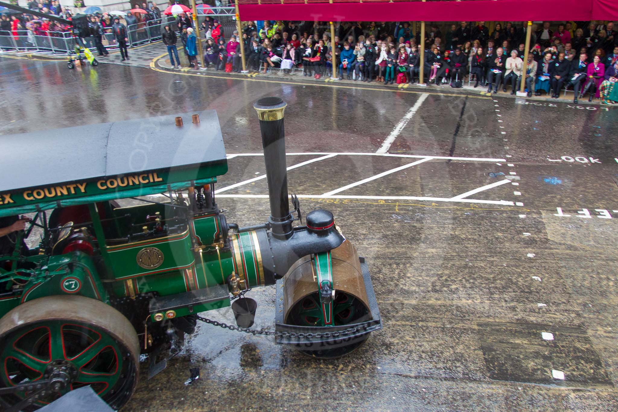 Lord Mayor's Show 2013: 70-Worshipful Company of Paviors-which brings together construction-industry professionals involved with roads and pavements.This year's float features the 'pig' that mediaeval paviors would have cleared from city streets and it towed by a steamroller from Amberley museum..
Press stand opposite Mansion House, City of London,
London,
Greater London,
United Kingdom,
on 09 November 2013 at 11:39, image #851