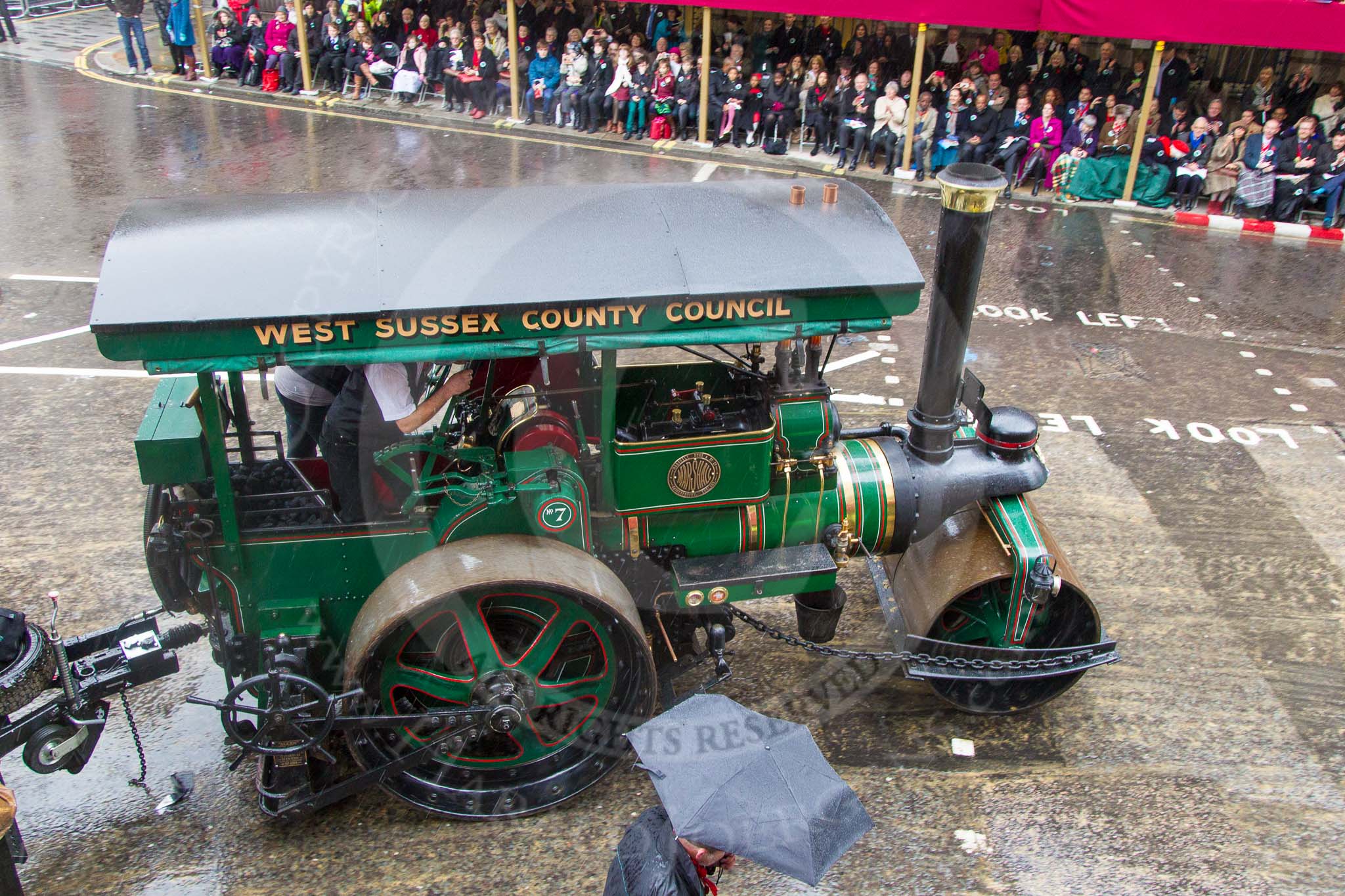 Lord Mayor's Show 2013: 70-Worshipful Company of Paviors-which brings together construction-industry professionals involved with roads and pavements.This year's float features the 'pig' that mediaeval paviors would have cleared from city streets and it towed by a steamroller from Amberley museum..
Press stand opposite Mansion House, City of London,
London,
Greater London,
United Kingdom,
on 09 November 2013 at 11:39, image #853