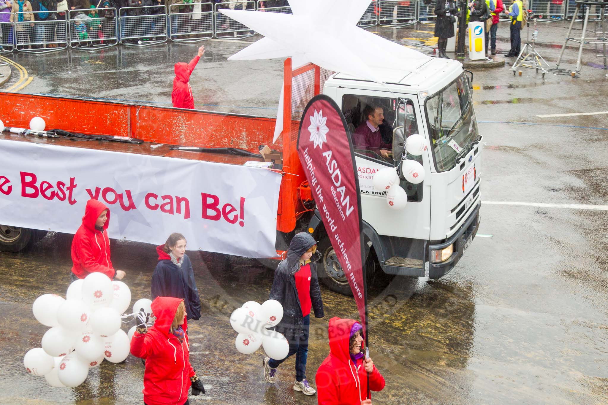 Lord Mayor's Show 2013: 72-ASDAN Education-is global charity dedicated to developing young people's skills trough learning and skills development..
Press stand opposite Mansion House, City of London,
London,
Greater London,
United Kingdom,
on 09 November 2013 at 11:40, image #868