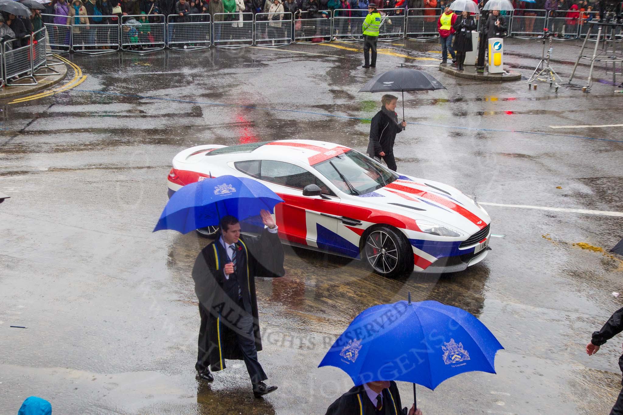 Lord Mayor's Show 2013: 78-Aston Martin Lagonda representing the Coachmakers- reflecting its modern association with the motor industry, the Company of Coachmakers and Coach Harness Makers is collaborating with Aston Martin, which this year celebrate 100 years of 'power, beauty and soul'..
Press stand opposite Mansion House, City of London,
London,
Greater London,
United Kingdom,
on 09 November 2013 at 11:43, image #941