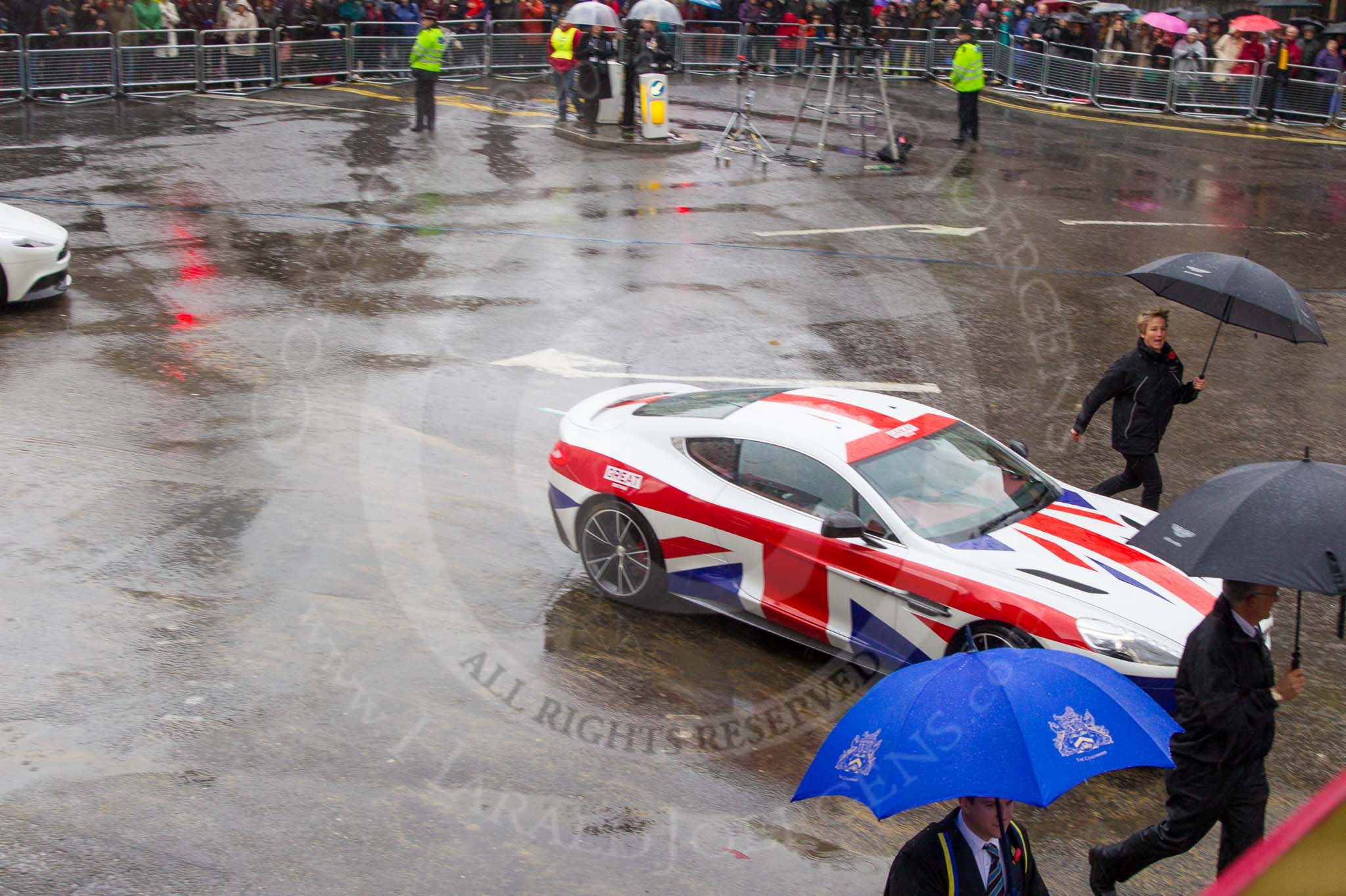 Lord Mayor's Show 2013: 78-Aston Martin Lagonda representing the Coachmakers- reflecting its modern association with the motor industry, the Company of Coachmakers and Coach Harness Makers is collaborating with Aston Martin, which this year celebrate 100 years of 'power, beauty and soul'..
Press stand opposite Mansion House, City of London,
London,
Greater London,
United Kingdom,
on 09 November 2013 at 11:43, image #942