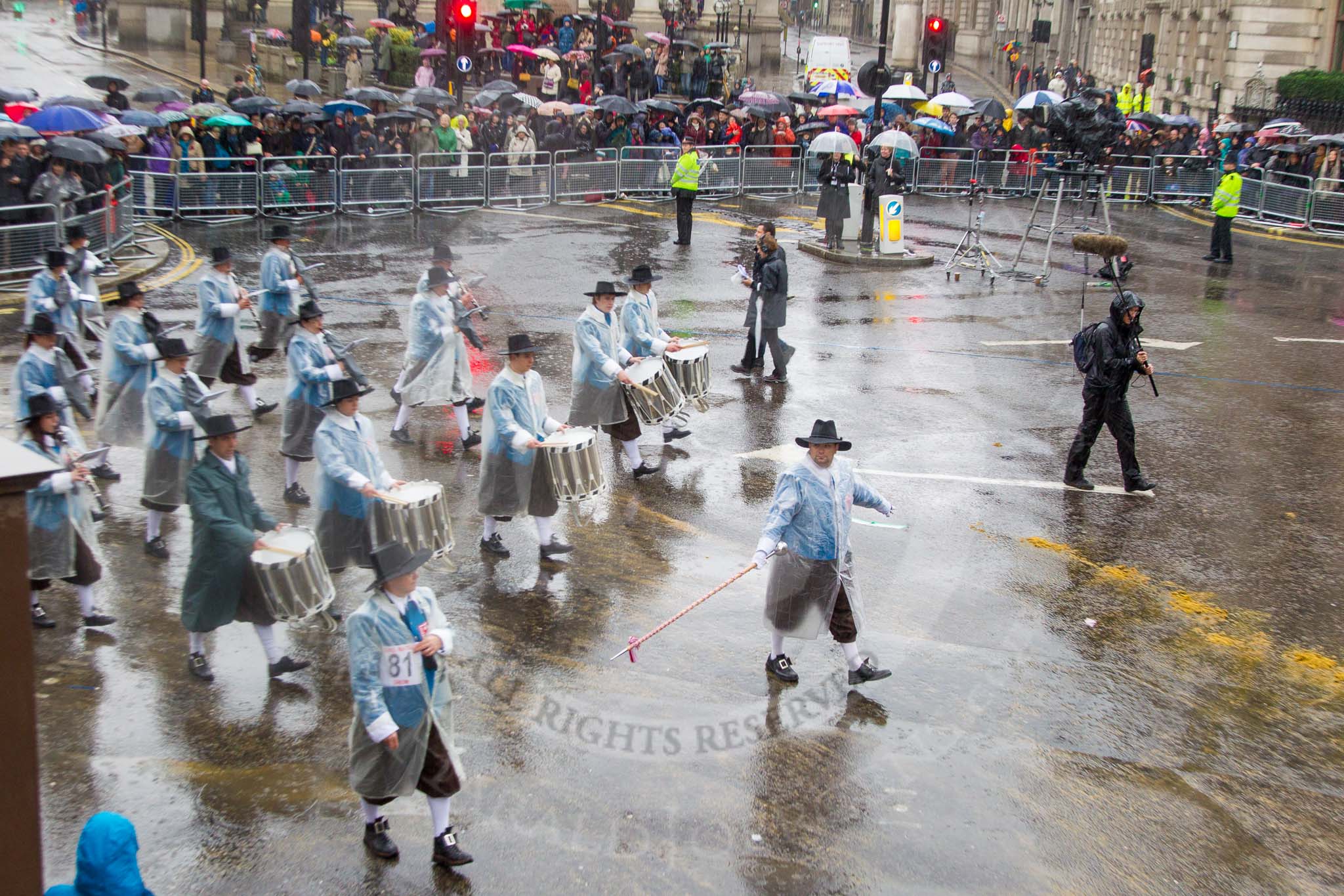 Lord Mayor's Show 2013: 81-Zunft Zur Zimmerleuten Band- the band traditionally supports the Zurich Swiss Gild of the Zimmerleuten in its parade and pageants, and is continuing that tradition today..
Press stand opposite Mansion House, City of London,
London,
Greater London,
United Kingdom,
on 09 November 2013 at 11:44, image #966