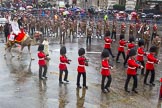 Lord Mayor's Show 2013: 6-Worshipful Company of Grocers- The Spice of Life, represented by the Coldstream Guards, G Company 7th Rifles,here they are joined by Cocoso the camel..
Press stand opposite Mansion House, City of London,
London,
Greater London,
United Kingdom,
on 09 November 2013 at 11:02, image #170