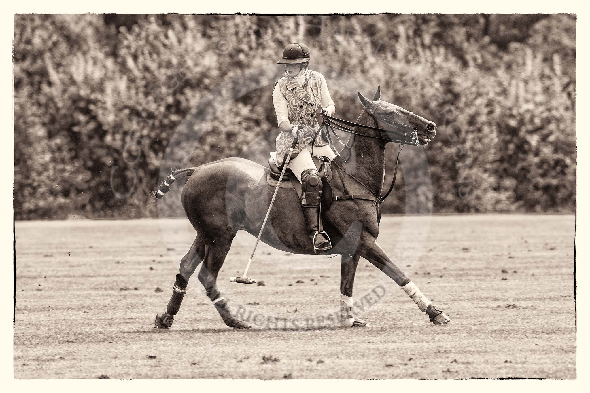 7th Heritage Polo Cup semi-finals: Turning her pony - Sheena Robertson..
Hurtwood Park Polo Club,
Ewhurst Green,
Surrey,
United Kingdom,
on 04 August 2012 at 13:35, image #157