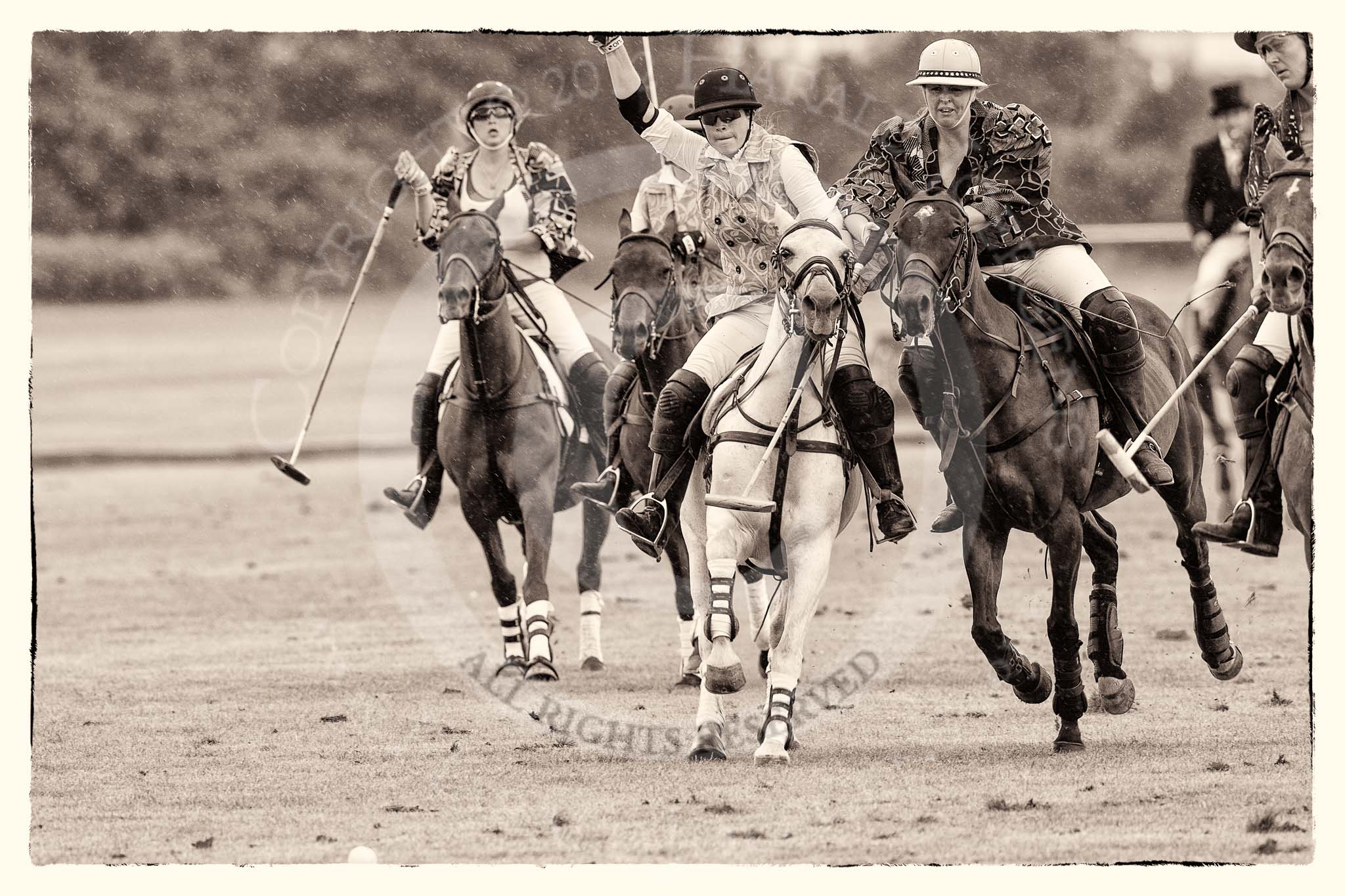 7th Heritage Polo Cup semi-finals: Heloise Lorentzen of the Amazons of Polo Polistas asking for the line from the AMG PETROENERGY Player Erin Jones..
Hurtwood Park Polo Club,
Ewhurst Green,
Surrey,
United Kingdom,
on 04 August 2012 at 14:05, image #197