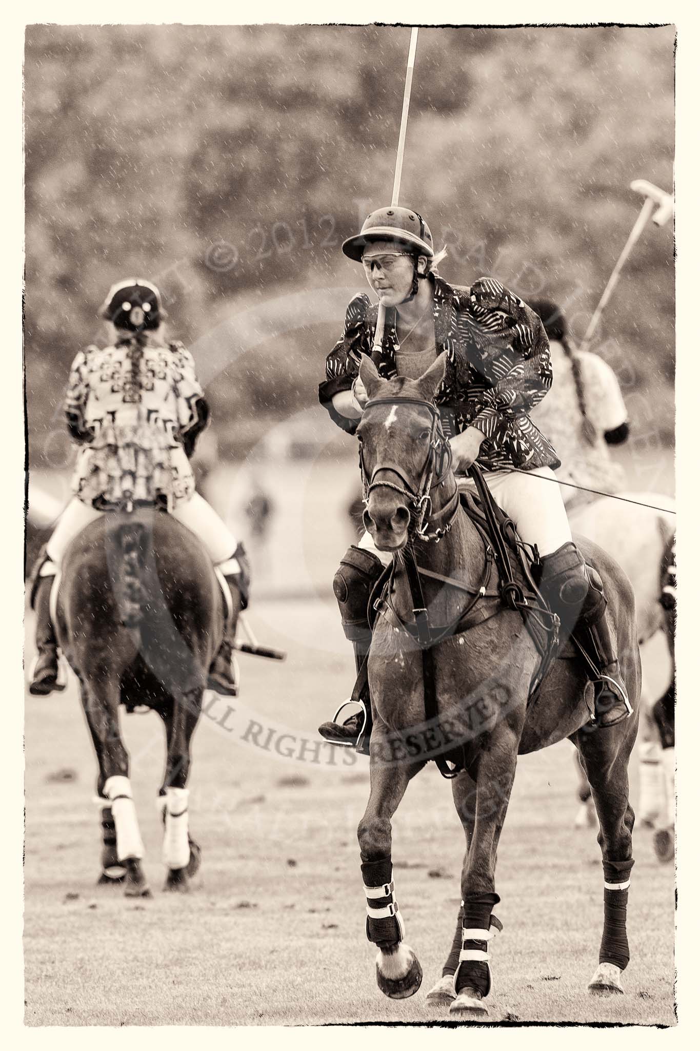 7th Heritage Polo Cup semi-finals: Annabel McNaught-Davis riding back to the pony lines..
Hurtwood Park Polo Club,
Ewhurst Green,
Surrey,
United Kingdom,
on 04 August 2012 at 14:05, image #200