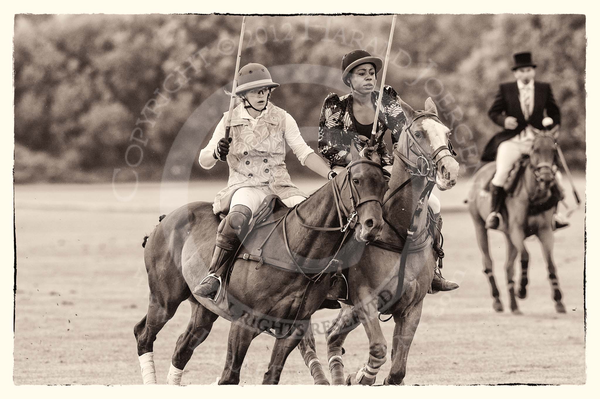 7th Heritage Polo Cup semi-finals: Emma Boers of the Amazons of Polo taking the man...Uneku Atawodi from Nigeria..
Hurtwood Park Polo Club,
Ewhurst Green,
Surrey,
United Kingdom,
on 04 August 2012 at 14:10, image #202