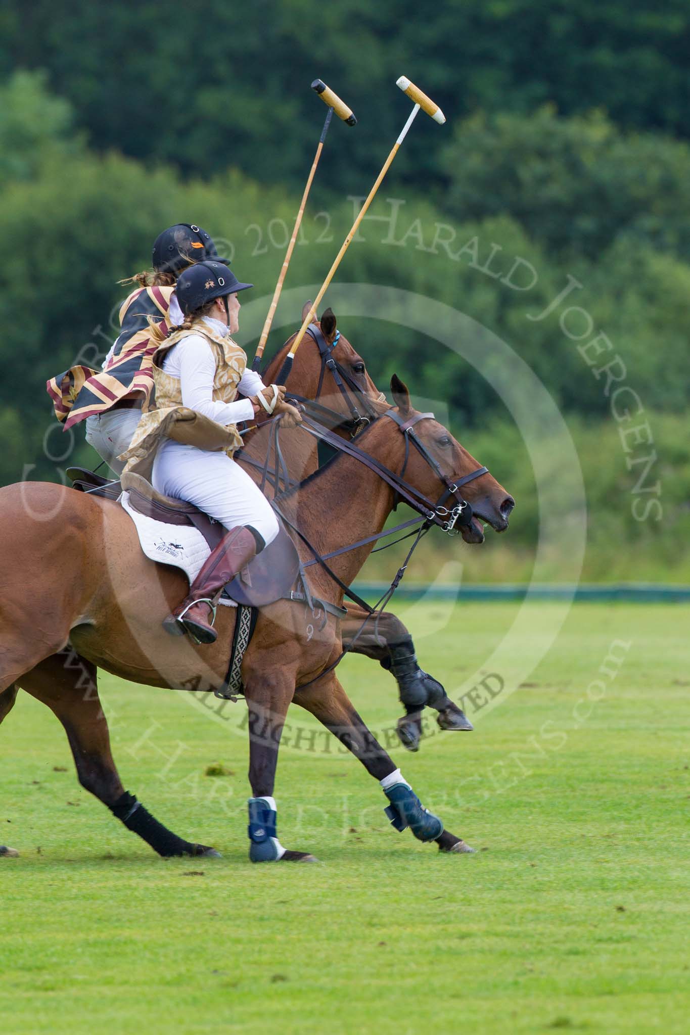 7th Heritage Polo Cup semi-finals: Rosie Ross leads on the ball. Barbara P Zingg on the ride off..
Hurtwood Park Polo Club,
Ewhurst Green,
Surrey,
United Kingdom,
on 04 August 2012 at 13:32, image #144