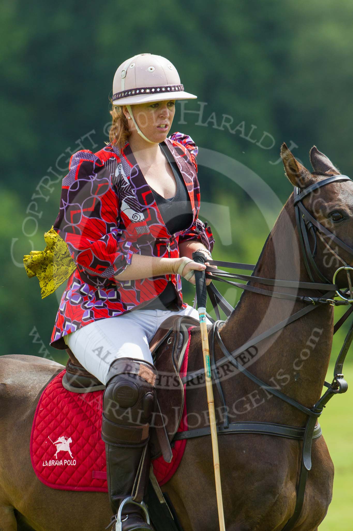 7th Heritage Polo Cup semi-finals: Erin Jones from South Africa wearing DZNY Fashion Design sponsored by AMG PETROENERGY..
Hurtwood Park Polo Club,
Ewhurst Green,
Surrey,
United Kingdom,
on 04 August 2012 at 13:40, image #167