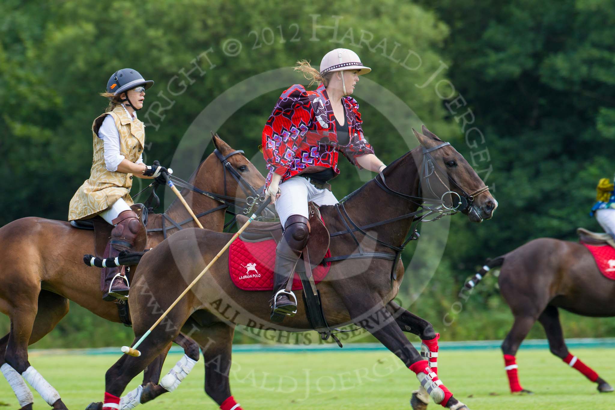 7th Heritage Polo Cup semi-finals: Erin Jones AMG PETROENERGY wearing DZNY Fashion Design Nigeria..
Hurtwood Park Polo Club,
Ewhurst Green,
Surrey,
United Kingdom,
on 04 August 2012 at 13:48, image #173