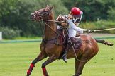 7th Heritage Polo Cup semi-finals: Sarah Wisman taking a nearside backshot..
Hurtwood Park Polo Club,
Ewhurst Green,
Surrey,
United Kingdom,
on 04 August 2012 at 13:35, image #158
