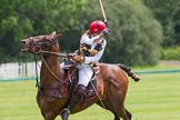 7th Heritage Polo Cup semi-finals: Sarah Wisman looking back swinging through the nearside back..
Hurtwood Park Polo Club,
Ewhurst Green,
Surrey,
United Kingdom,
on 04 August 2012 at 13:35, image #159