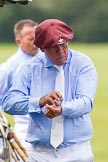 7th Heritage Polo Cup semi-finals: La Mariposa Argentina Mariano Darritchon putting on his T.M.Lewin Luxury Twill Shirt and cufflinks..
Hurtwood Park Polo Club,
Ewhurst Green,
Surrey,
United Kingdom,
on 04 August 2012 at 15:23, image #226