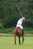 7th Heritage Polo Cup semi-finals: La Golondrina Argentina Polo Patron Paul Oberschneider in T.M.Lewin LuxuryWhite Twill Shirt taking a full swing..
Hurtwood Park Polo Club,
Ewhurst Green,
Surrey,
United Kingdom,
on 04 August 2012 at 15:25, image #234