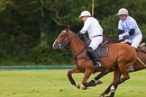 7th Heritage Polo Cup semi-finals: Paul Oberschneider Polo Patron of La Golondrina Argentina on the ball..
Hurtwood Park Polo Club,
Ewhurst Green,
Surrey,
United Kingdom,
on 04 August 2012 at 15:38, image #257