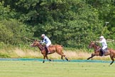 7th Heritage Polo Cup semi-finals: Mariano Darritchon braking away followed by Paul Oberschneider..
Hurtwood Park Polo Club,
Ewhurst Green,
Surrey,
United Kingdom,
on 04 August 2012 at 16:17, image #324