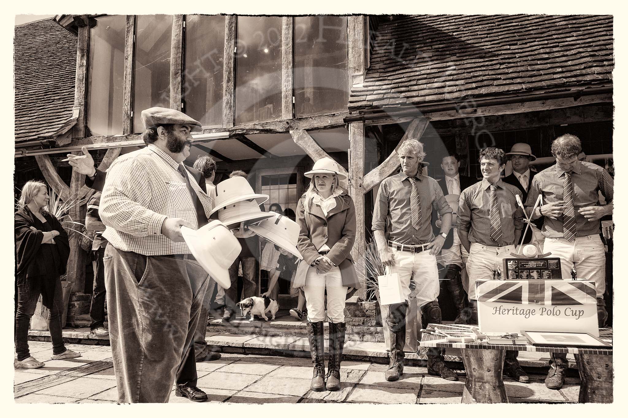 7th Heritage Polo Cup finals: Doug Simpson of ASCOT TOP HATS presenting the WINNERS & RUNNERS UP with Pith Helmets..
Hurtwood Park Polo Club,
Ewhurst Green,
Surrey,
United Kingdom,
on 05 August 2012 at 14:43, image #96