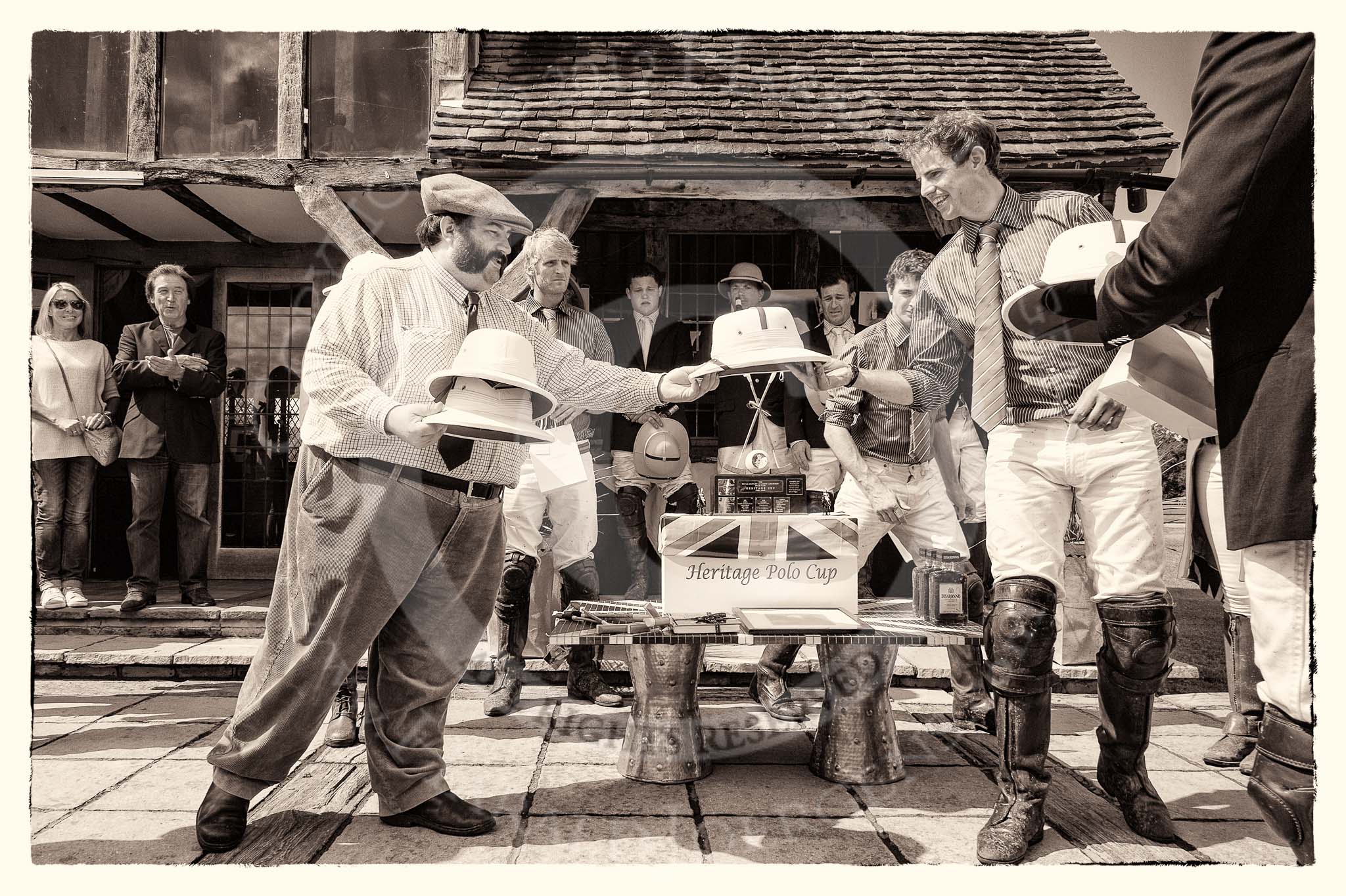 7th Heritage Polo Cup finals: Doug Simpson of ASCOT TOP HATS presenting the WINNERS & RUNNERS UP with Pith Helmets..
Hurtwood Park Polo Club,
Ewhurst Green,
Surrey,
United Kingdom,
on 05 August 2012 at 14:44, image #98