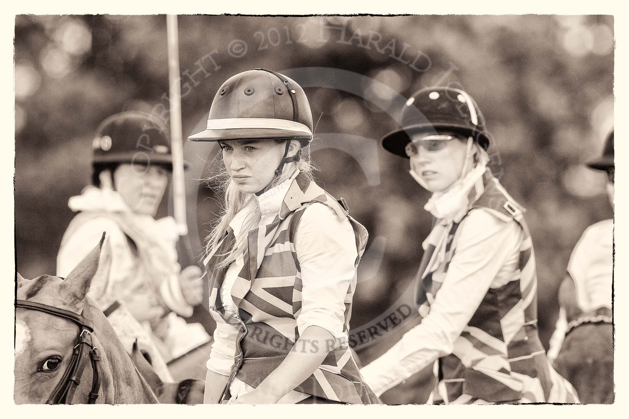 7th Heritage Polo Cup finals: The Ladies of the British Empire, Liberty Freedom: 
Charlie Howel & Leigh Fisher..
Hurtwood Park Polo Club,
Ewhurst Green,
Surrey,
United Kingdom,
on 05 August 2012 at 15:10, image #124