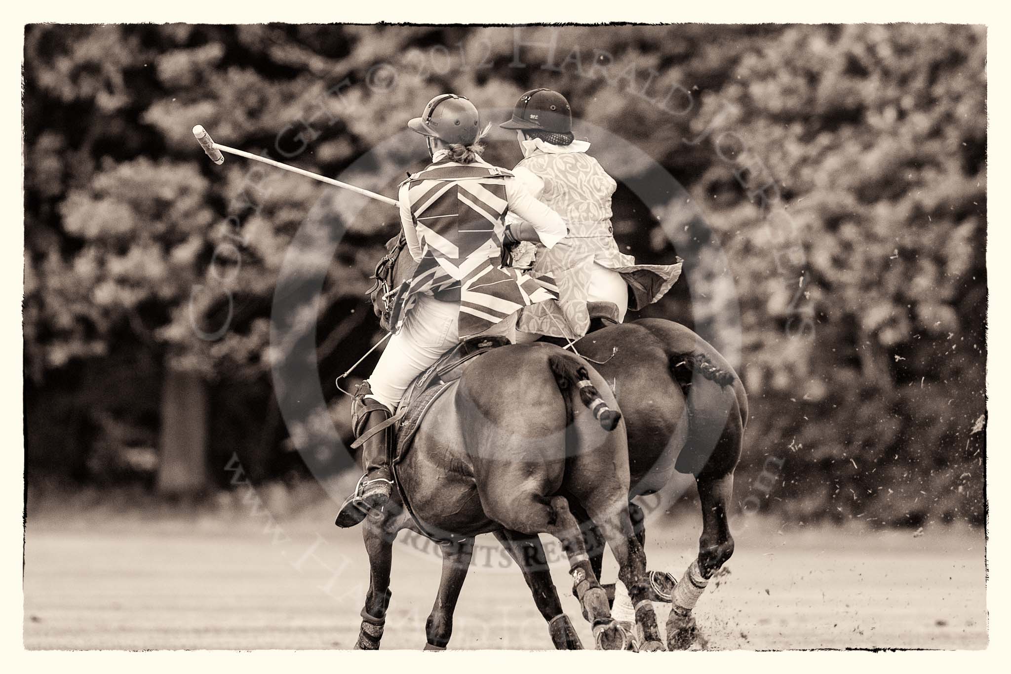 7th Heritage Polo Cup finals: Sarah Wisman ridden off by Barbara P Zingg..
Hurtwood Park Polo Club,
Ewhurst Green,
Surrey,
United Kingdom,
on 05 August 2012 at 15:17, image #148
