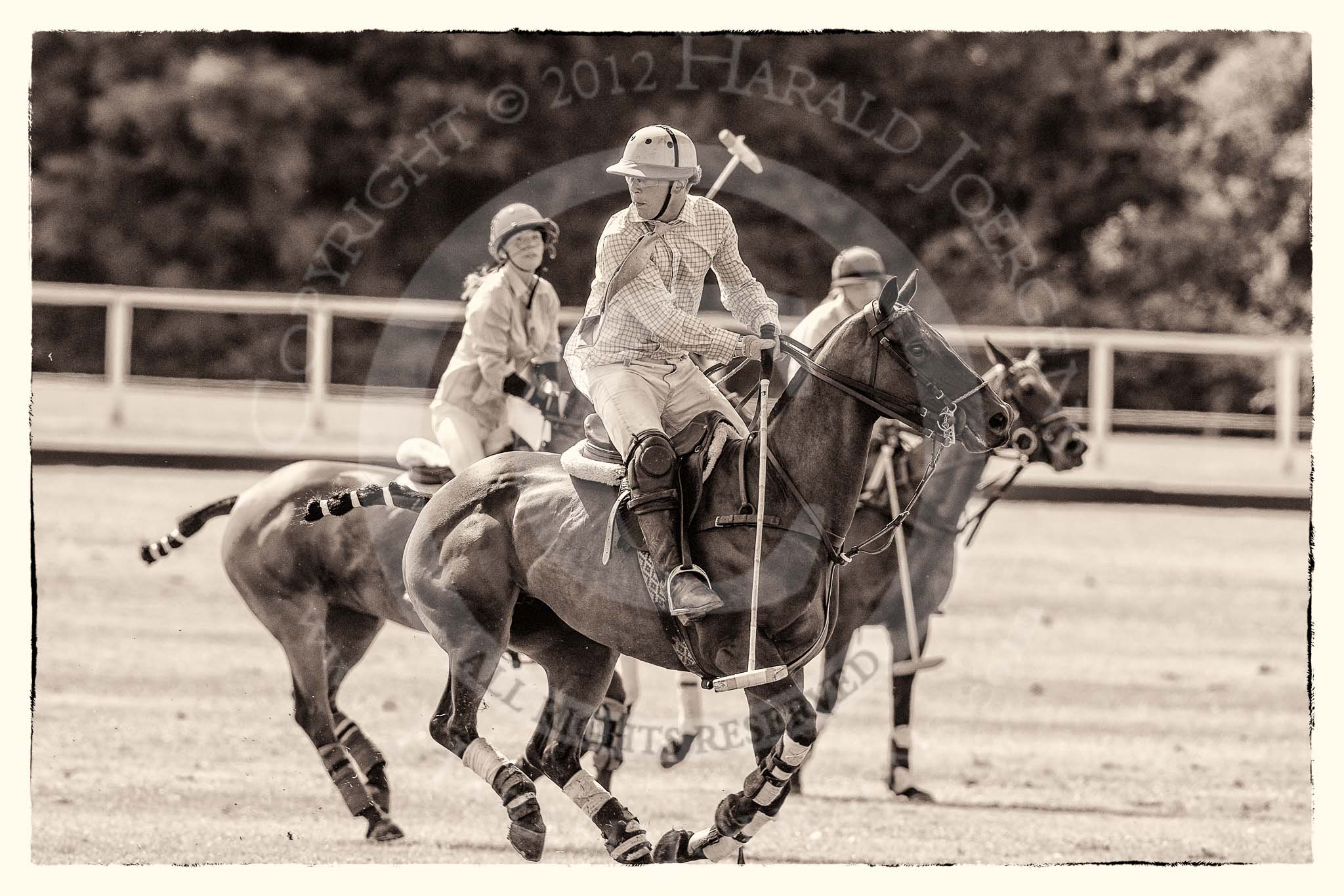 7th Heritage Polo Cup finals: Nico Talamoni of Team Emerging Switzerland..
Hurtwood Park Polo Club,
Ewhurst Green,
Surrey,
United Kingdom,
on 05 August 2012 at 15:40, image #187