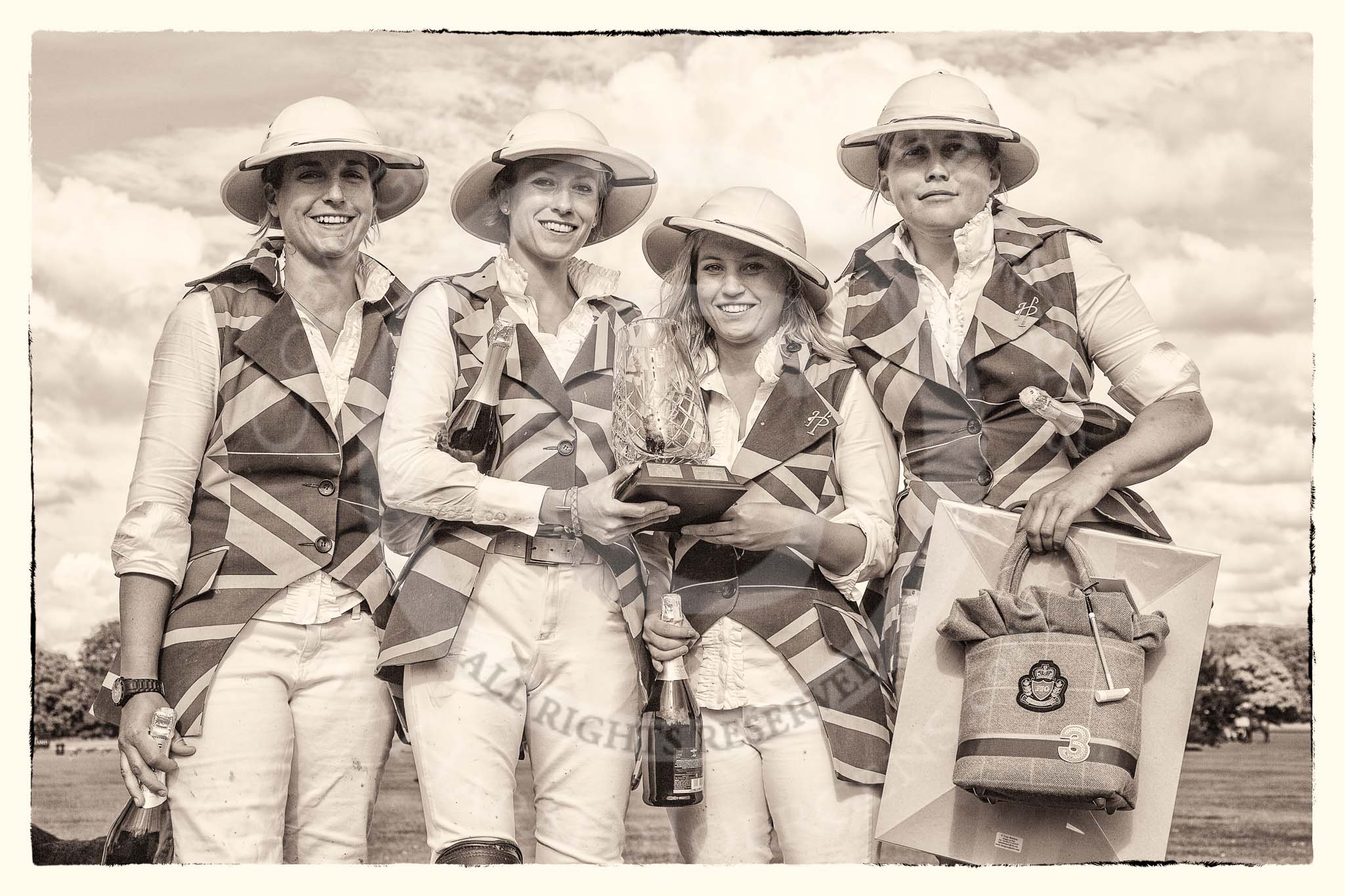 Photo 1208051704165D21991HaraldJoergensE1024 7th Heritage Polo Cup finals: Ladies of the British Empire holding the Ladies HERITAGE POLO CUP 2012 ltr Sarah Wisman, Leigh Fisher, Charlie Howel, Rosie Ross..
Hurtwood Park Polo Club,
Ewhurst Green,
Surrey,
United Kingdom,
on 05 August 2012 at 17:04, image #262