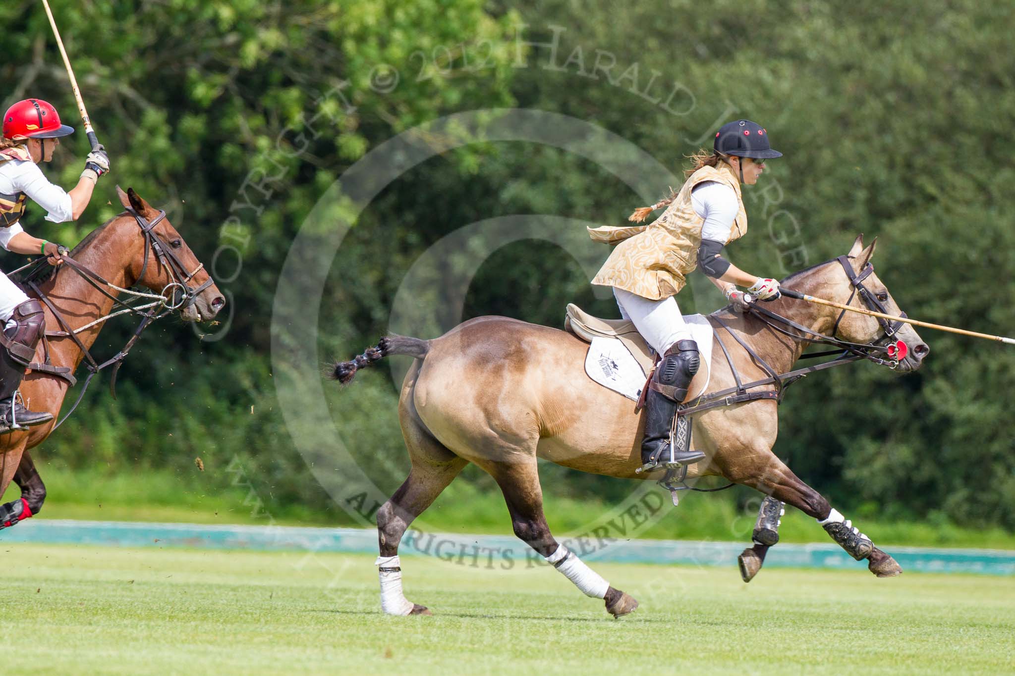 7th Heritage Polo Cup finals: The Amazons of Polo, sponsored by Polistas:
Heloise Lorentzen..
Hurtwood Park Polo Club,
Ewhurst Green,
Surrey,
United Kingdom,
on 05 August 2012 at 15:14, image #131