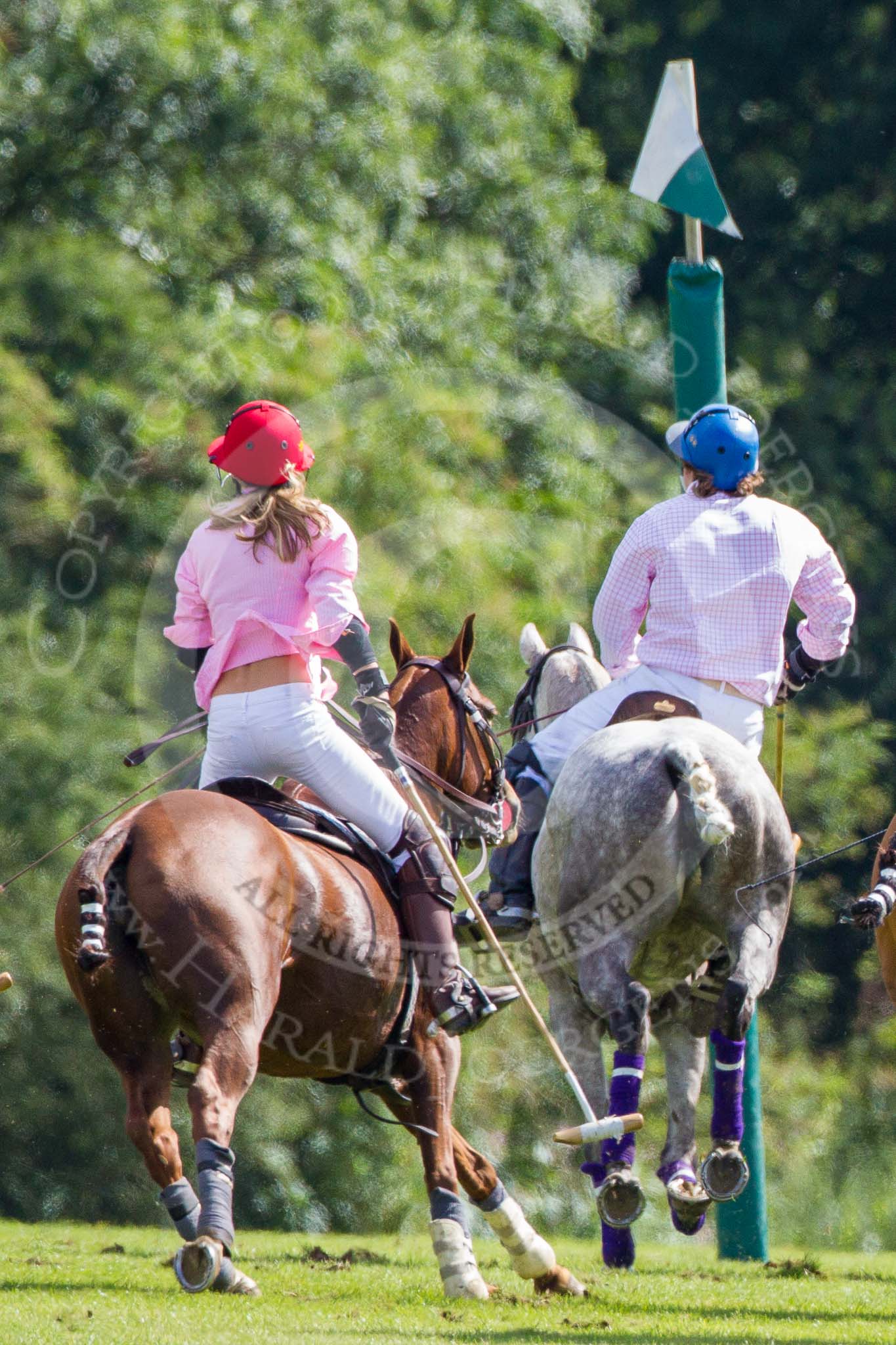 7th Heritage Polo Cup finals: Emerging Switzerland Clare Payne with Polo Pro Justo Saveedra..
Hurtwood Park Polo Club,
Ewhurst Green,
Surrey,
United Kingdom,
on 05 August 2012 at 15:26, image #167