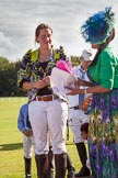 7th Heritage Polo Cup finals: Sophie Kyriazi from Kenia receiving the Prize of Jennifer Cattlin Millinery Creations 2012..
Hurtwood Park Polo Club,
Ewhurst Green,
Surrey,
United Kingdom,
on 05 August 2012 at 16:57, image #240